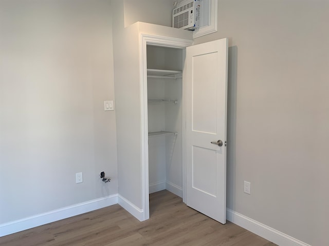 closet featuring an AC wall unit