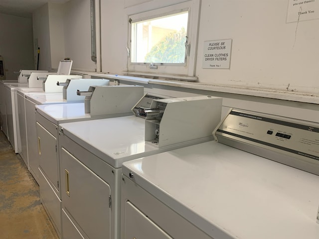 common laundry area featuring washing machine and dryer