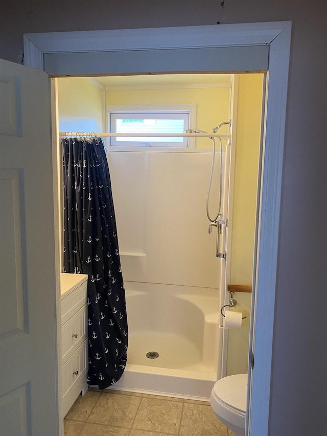 bathroom with toilet, tile patterned floors, a shower with shower curtain, and vanity