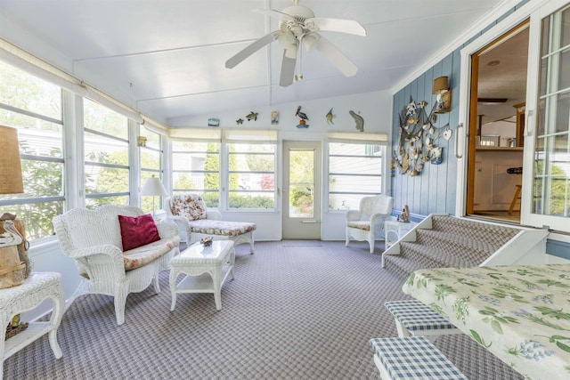 sunroom with a ceiling fan
