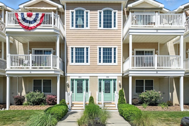 305 E Bennett Ave Unit A, Wildwood, NJ 08260 - multi unit property with a balcony and stucco siding