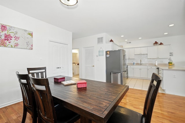 305 E Bennett Ave Unit A, Wildwood, NJ 08260 - dining area featuring light wood-style flooring and recessed lighting