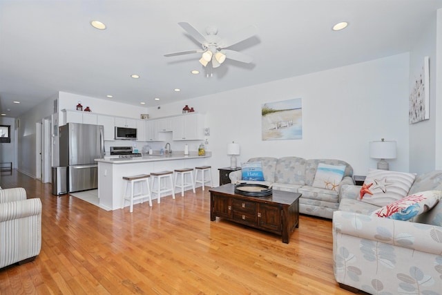 305 E Bennett Ave Unit A, Wildwood, NJ 08260 - living area featuring light wood-style floors, a ceiling fan, and recessed lighting