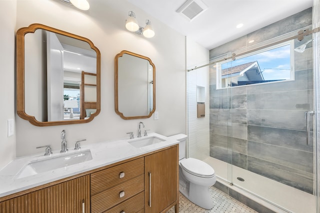 242 83rd St, Stone Harbor, NJ 08247 - bathroom featuring a stall shower and double vanity