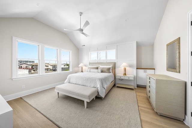 242 83rd St, Stone Harbor, NJ 08247 - bedroom with vaulted ceiling, light wood-style floors, and ceiling fan