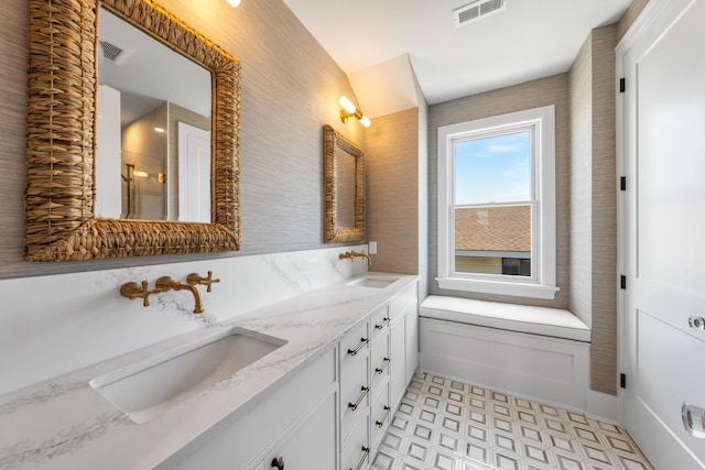 242 83rd St, Stone Harbor, NJ 08247 - full bath featuring tile patterned floors, double vanity, and a shower with shower door
