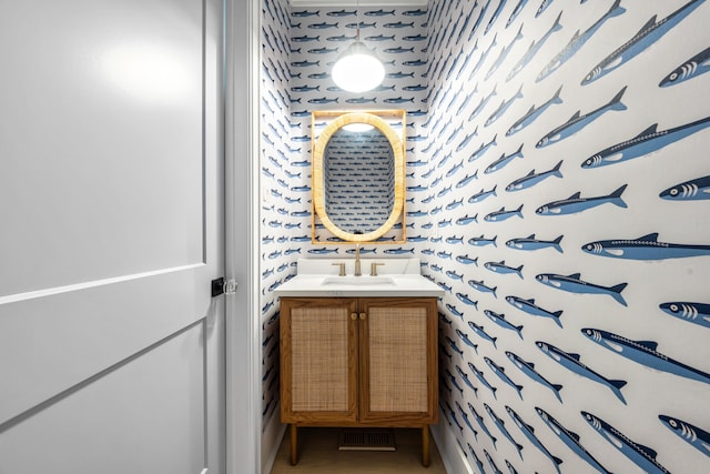 242 83rd St, Stone Harbor, NJ 08247 - bathroom featuring wallpapered walls and vanity