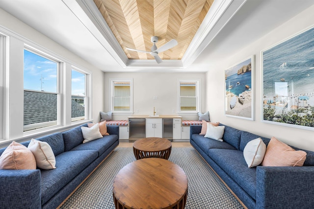 242 83rd St, Stone Harbor, NJ 08247 - living area featuring a tray ceiling, ceiling fan, and light wood-type flooring