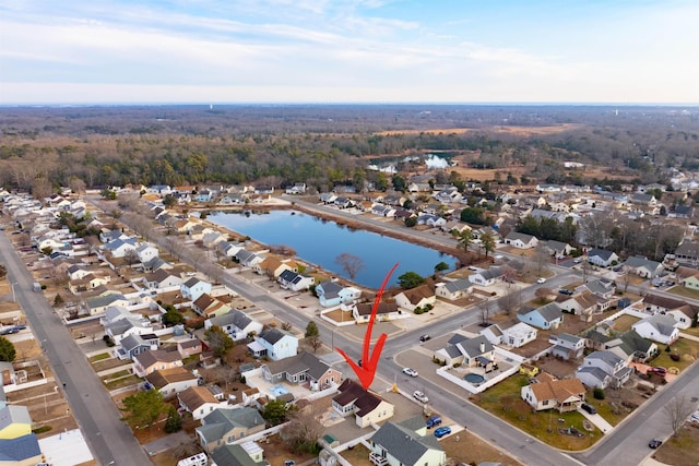 aerial view featuring a residential view and a water view