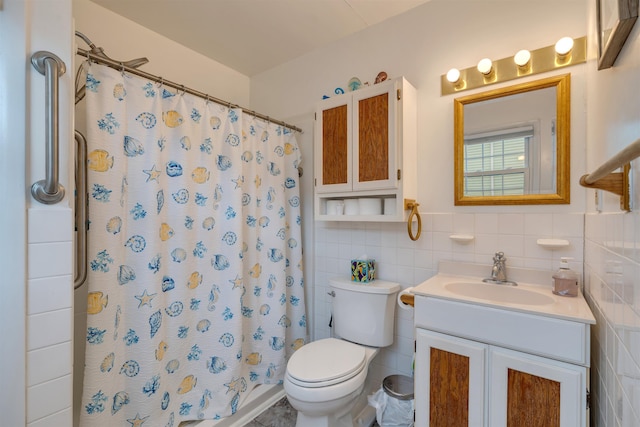 full bath with a shower with shower curtain, tile walls, toilet, and vanity