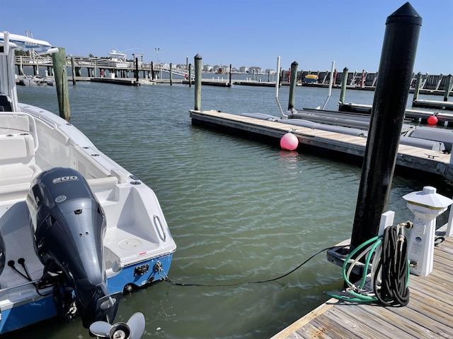 dock area with a water view
