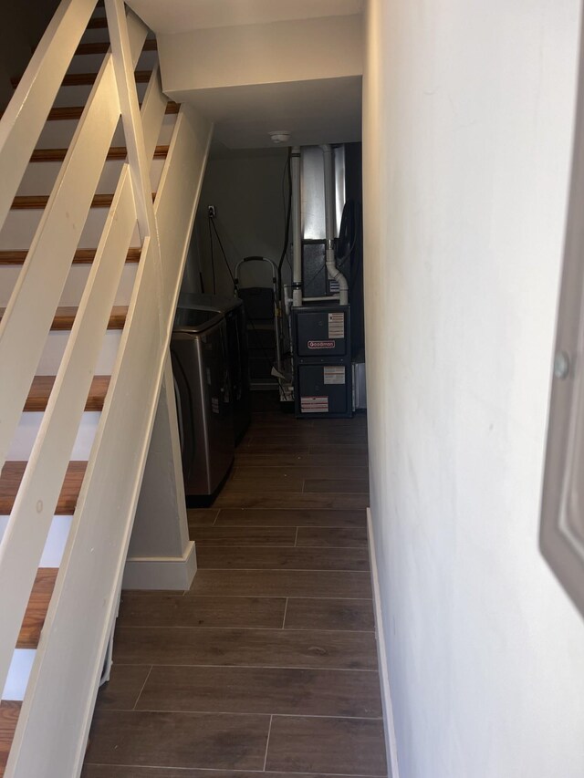 100 E Poplar Ave Unit 3, Wildwood, NJ 08260 - hall featuring washing machine and dryer, heating unit, wood finished floors, and stairs