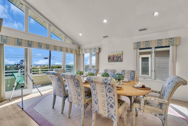 dining area with recessed lighting, visible vents, and light wood finished floors