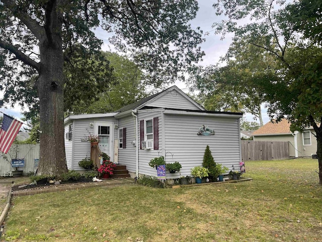 view of front of home with a front lawn