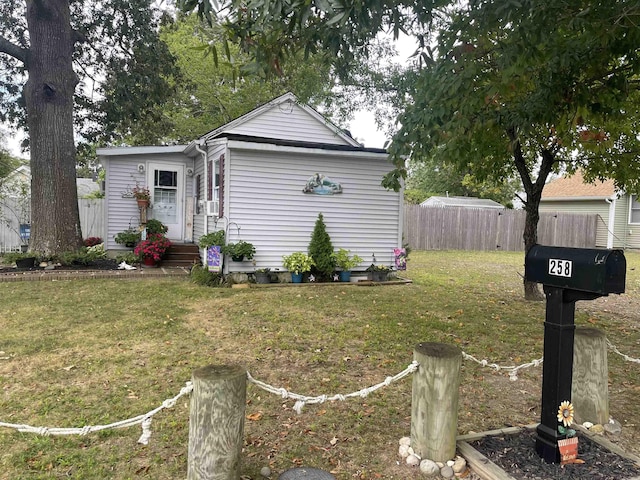 view of front of home with a front yard