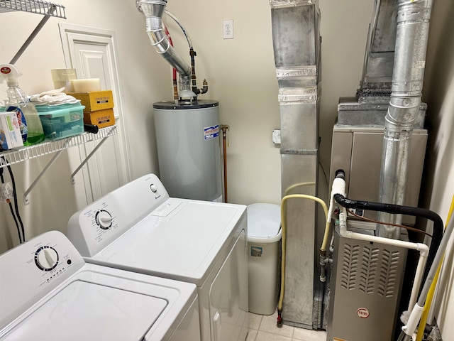 407 W Andrews Ave Unit 200, Wildwood, NJ 08260 - washroom with washing machine and dryer, water heater, and light tile patterned floors