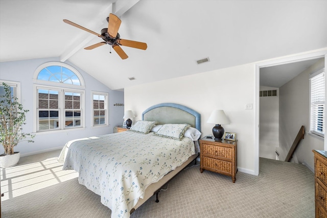 carpeted bedroom featuring lofted ceiling with beams, visible vents, and baseboards