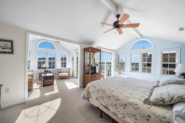 carpeted bedroom with vaulted ceiling with beams, baseboards, and ceiling fan