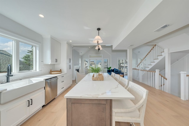 520 21st St, Avalon, NJ 08202 - kitchen with dishwasher, light wood-style flooring, open floor plan, a center island, and recessed lighting