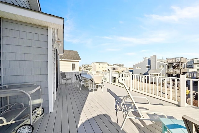 367 21st St, Avalon, NJ 08202 - wooden deck featuring outdoor dining area and a residential view