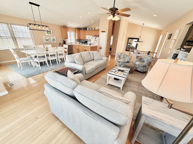 367 21st St, Avalon, NJ 08202 - living room with lofted ceiling, light wood-style flooring, a ceiling fan, a chandelier, and recessed lighting