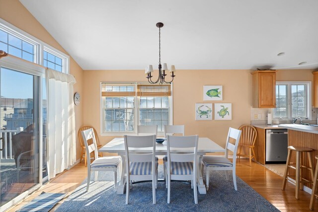 367 21st St, Avalon, NJ 08202 - dining room with light wood-type flooring, a chandelier, and lofted ceiling