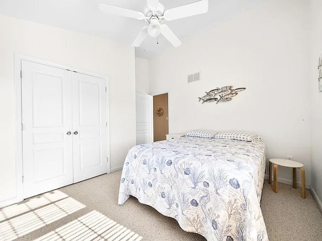 367 21st St, Avalon, NJ 08202 - bedroom with light colored carpet, a closet, lofted ceiling, and ceiling fan