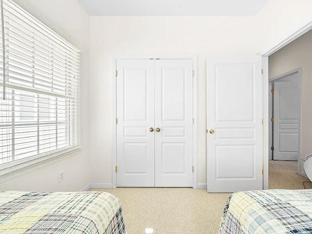 367 21st St, Avalon, NJ 08202 - bedroom featuring light carpet and a closet