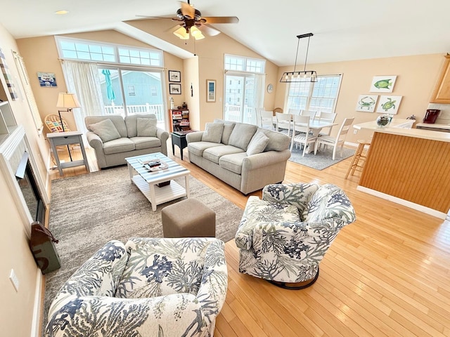 367 21st St, Avalon, NJ 08202 - living area with light wood-style flooring, a ceiling fan, and lofted ceiling