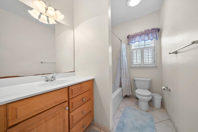 367 21st St, Avalon, NJ 08202 - bathroom with toilet, vanity, tile patterned flooring, shower / tub combo with curtain, and baseboards