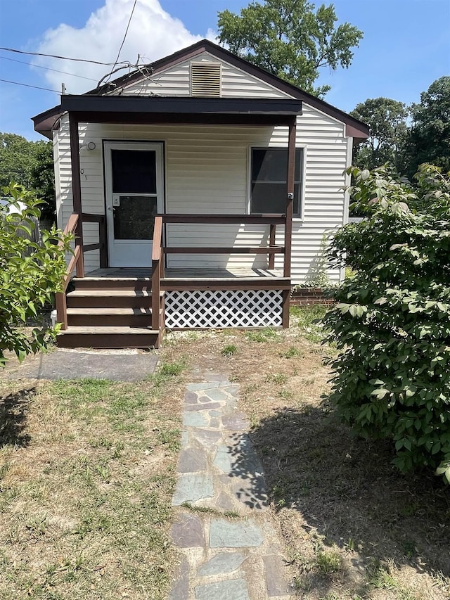 bungalow featuring covered porch