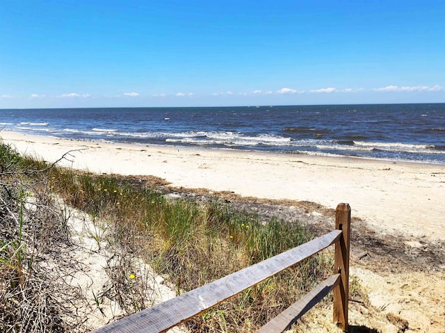 view of water feature with a beach view