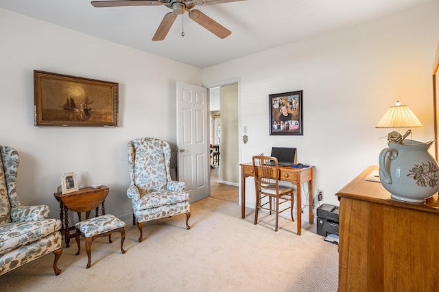 office with ceiling fan and light colored carpet