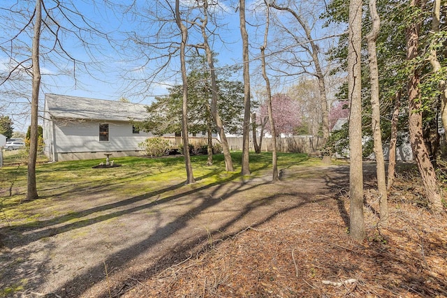 view of yard with fence