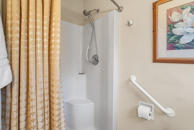 full bathroom with a shower with shower curtain