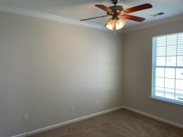 29 Falkirk Dr, Rio Grande, NJ 08242 - spare room featuring visible vents, baseboards, ornamental molding, a ceiling fan, and carpet floors