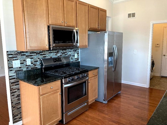 29 Falkirk Dr, Rio Grande, NJ 08242 - kitchen featuring tasteful backsplash, visible vents, washer / clothes dryer, and stainless steel appliances