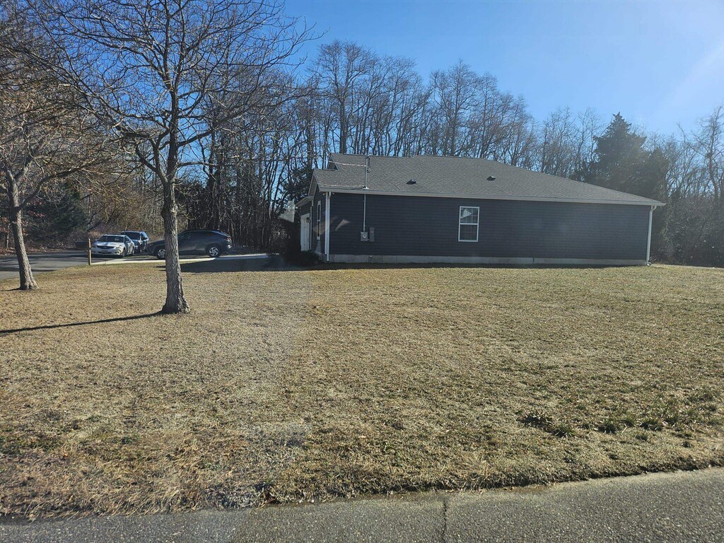 exterior space featuring a yard