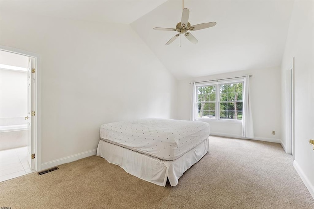 bedroom featuring visible vents, baseboards, carpet, high vaulted ceiling, and a ceiling fan