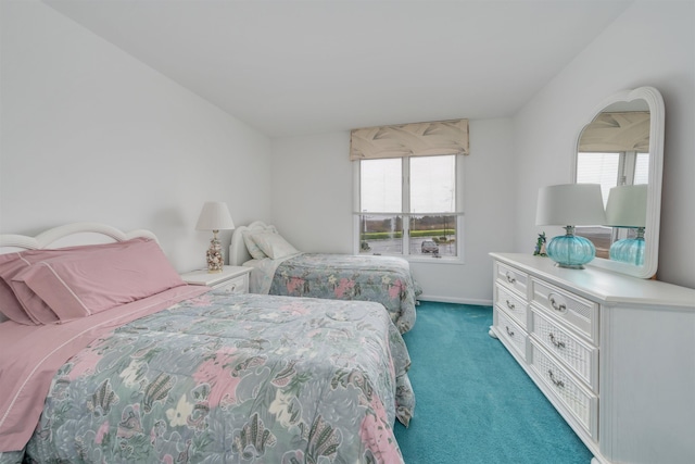 carpeted bedroom with baseboards