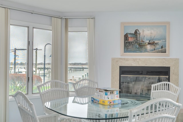 dining area featuring a fireplace