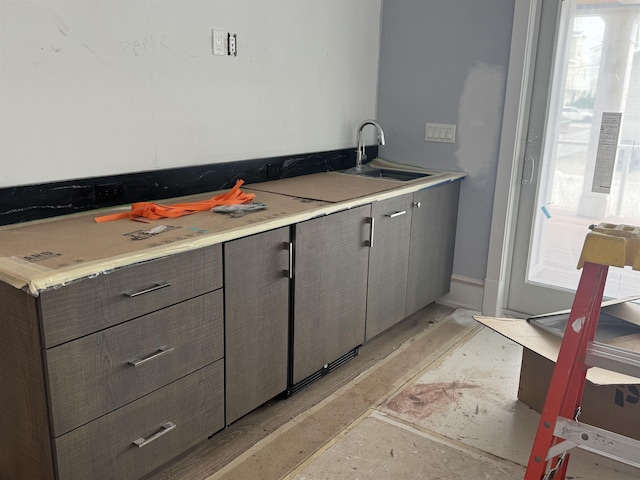 281 7th St, Avalon, NJ 08202 - kitchen featuring gray cabinetry and light countertops