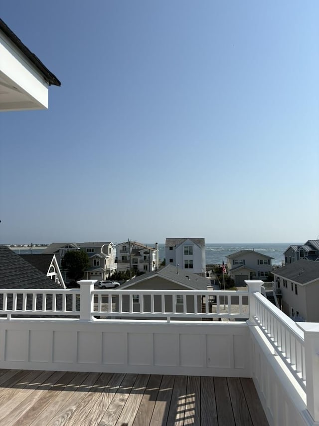281 7th St, Avalon, NJ 08202 - wooden deck featuring a water view