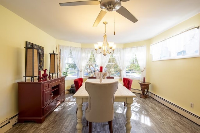 dining space with plenty of natural light, baseboard heating, and dark wood-type flooring