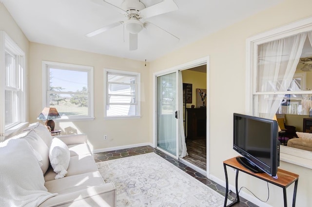 living room featuring ceiling fan