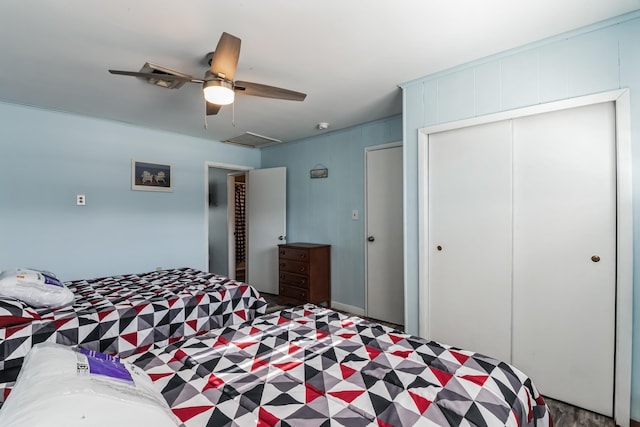 bedroom featuring ceiling fan and a closet