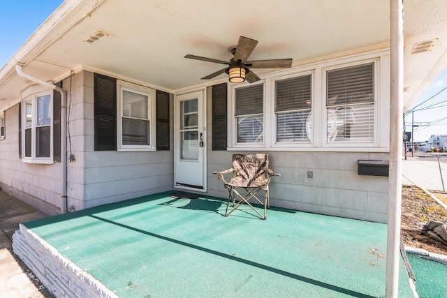 view of patio / terrace featuring ceiling fan