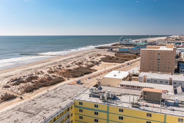 bird's eye view with a water view and a view of the beach