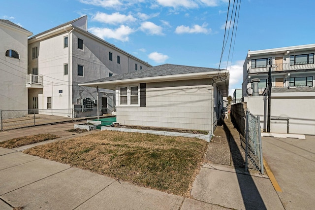 exterior space featuring a front lawn