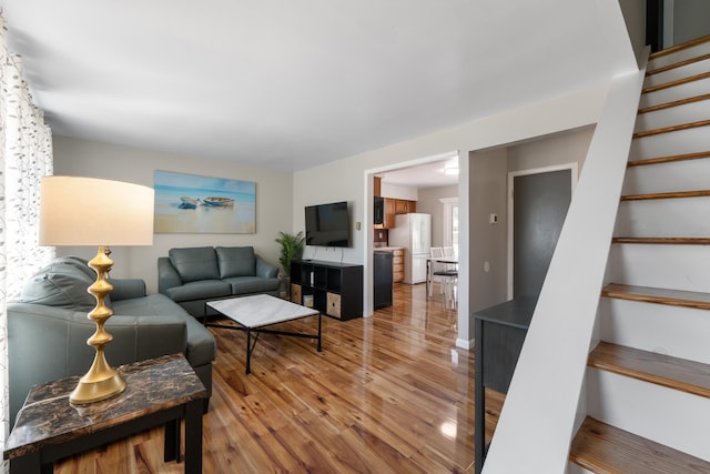 123 Broadway, Villas, NJ 08251 - living room featuring light wood-type flooring and stairs